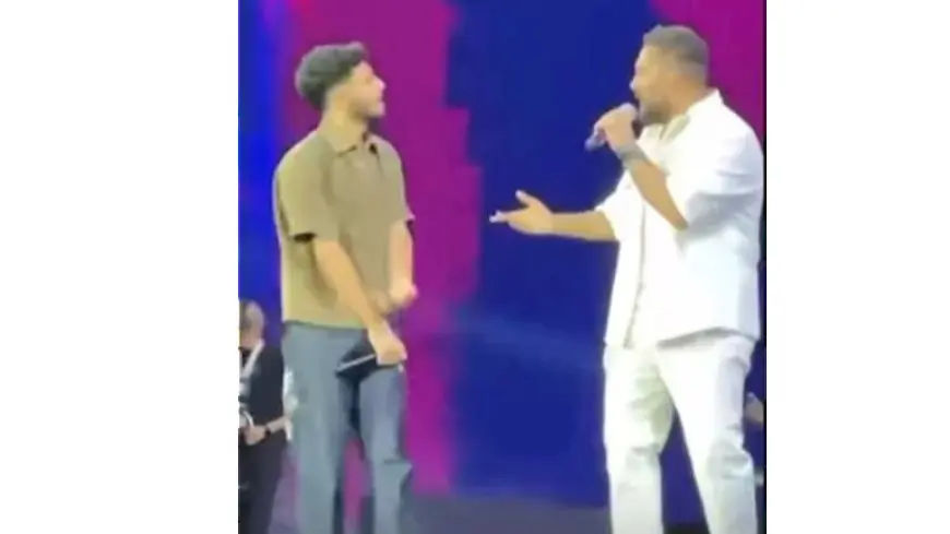 تامر حسني يقدم كريم أسامة في حفل العلمين الجديدة.. والأخير يشكره