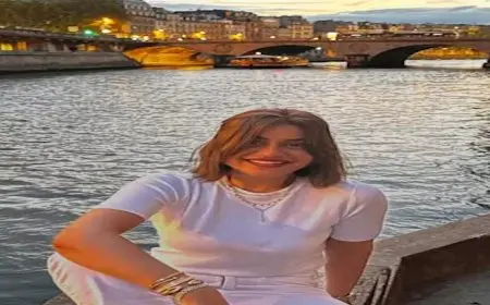 17 صورة لـ منة فضالي بإجازة الصيف من أمام نهر السين بفرنسا