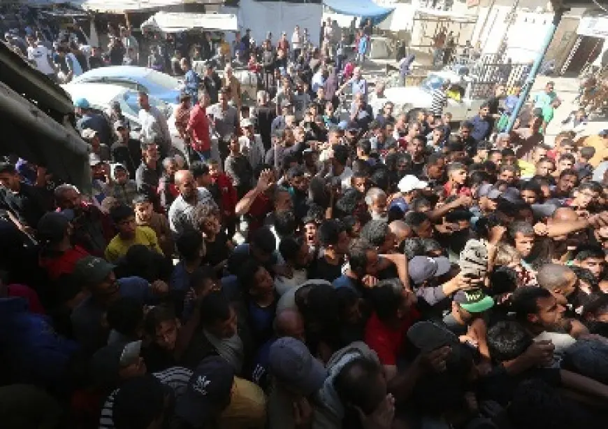 استشهاد 20 فلسطينيا أثناء محاولة الحصول على غذاء في دير البلح